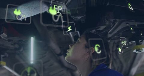 Mechanic analyzing digital diagnostics in modern auto workshop