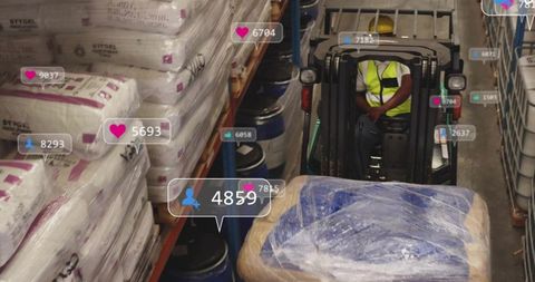 Warehouse worker using forklift with social media icons overlay