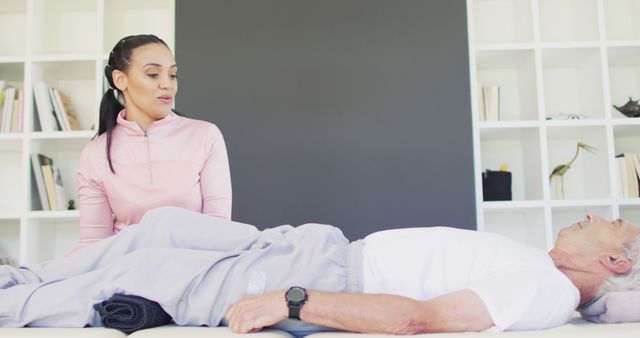 Physiotherapist Assisting Senior Patient during Therapy Session - Download Free Stock Images Pikwizard.com