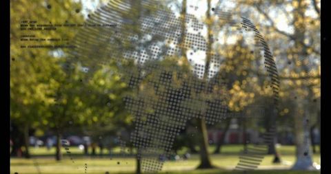 Semi-transparent dotted world map overlay on sunlit urban park with code-like text