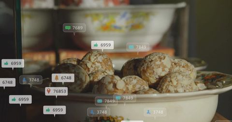 Bowl of almond-covered snacks surrounded by social media notification icons, symbolizing modern connectivity even during simple activities like snacking. Perfect for illustrating digital lifestyle trends, integration of everyday life with technology, or content creation ideas targeting tech-savvy audiences.