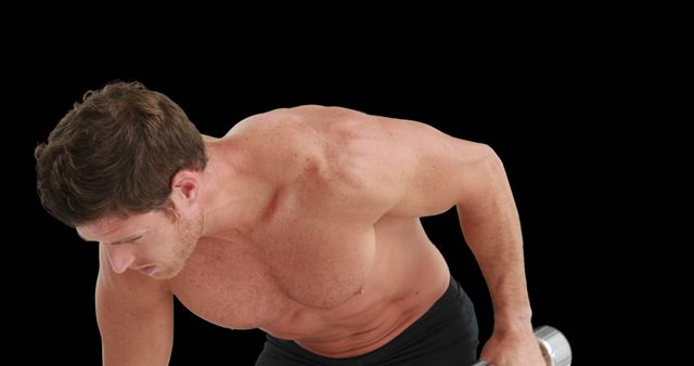 Muscular Man Performing Bent Over Dumbbell Row Against Black Background - Download Free Stock Images Pikwizard.com