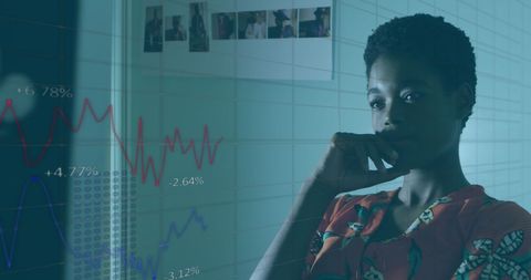 Businesswoman Analyzing Digital Financial Data in Office