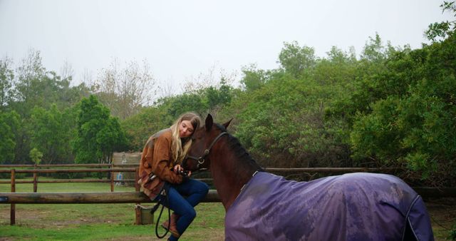 Young Woman Interacting With Horse in a Pasture - Download Free Stock Images Pikwizard.com