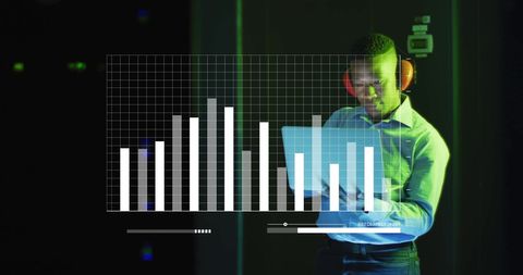 It professional analyzing data on laptop in server room
