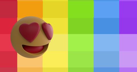 Heart-eyes emoji on vibrant rainbow background pride theme