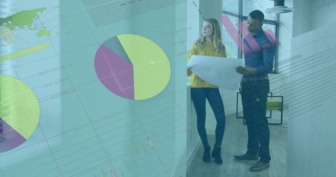 Architects Analyzing Blueprint in Modern Office Corridor