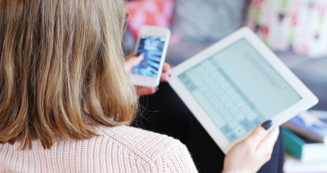 Woman Using Smartphone and Tablet in Cozy Home Environment - Download Free Stock Images Pikwizard.com