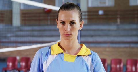 Determined Female Volleyball Player in Gymnasium