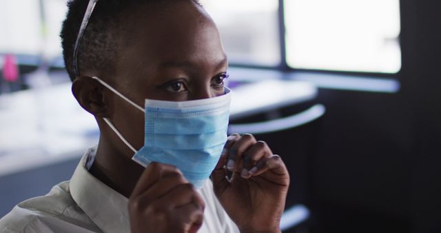 Female Doctor Preparing Protective Mask in Hospital - Download Free Stock Images Pikwizard.com