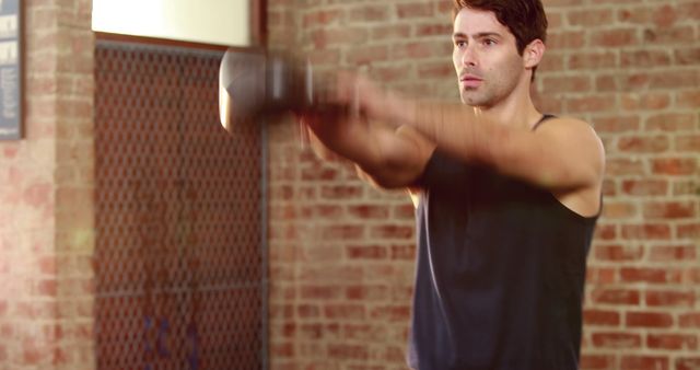 Young Man Exercising with Kettlebell in Urban Gym - Download Free Stock Images Pikwizard.com