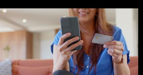 Asian Woman Shopping: Relaxed, Comfort, Technology in Modern Living Room