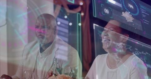 Mature couple enjoying upscale dinner with futuristic hud overlays, wine and laughter