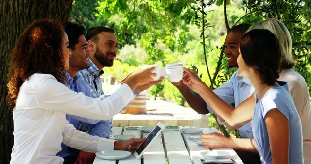 Diverse Friends Toasting Coffee In Summer Garden Gathering - Download Free Stock Images Pikwizard.com