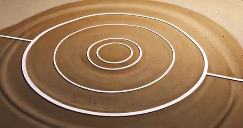 Zen Garden Circular Ripples on Sand for Meditation Tranquility