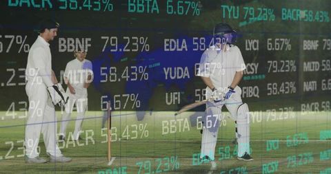 Cricket batsman on night field with stock market ticker overlay double exposure