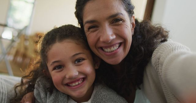 Portrait of happy biracial mother and daughter - Download Free Stock Photos Pikwizard.com