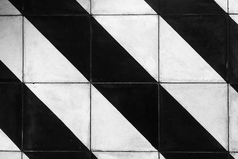 Monochrome geometric black and white diagonal checkered pattern