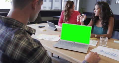 Team Meeting with Laptops and Analysis Documents