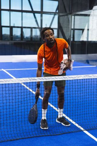 Intense Paddle Tennis Match Action
