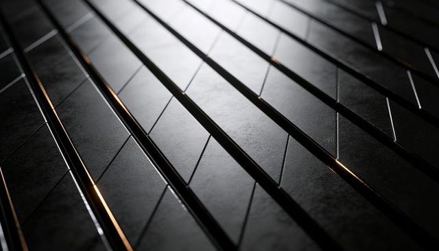 Dark Geometric Metal Panels with Amber LED Grooves and Diagonal Beveled Texture
