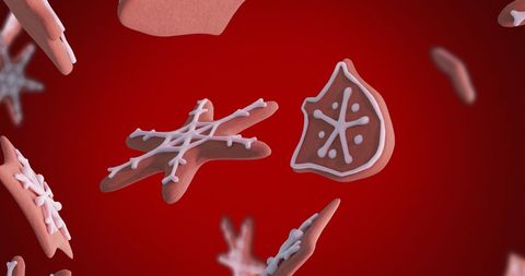 Floating christmas gingerbread cookies on festive red background