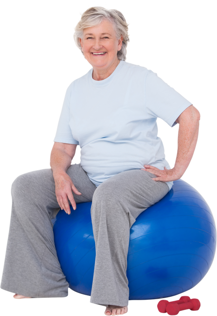 Transparent Fit Senior Woman Sitting on Blue Exercise Ball Smiling - Download Free Stock Videos Pikwizard.com