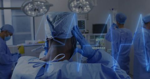 Stressed Medical Team in Surgery with Heartbeat Overlay - Download Free Stock Images Pikwizard.com