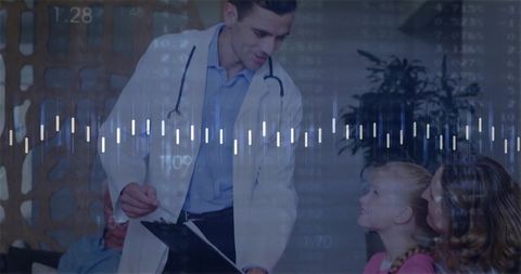 Caring Pediatric Doctor Consulting Young Patient with Parent