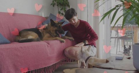 Affectionate dog owner bonding with loyal canine companion at cozy home
