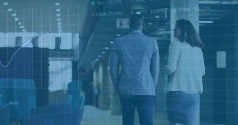 Business Colleagues Analyzing Finance in Modern Office