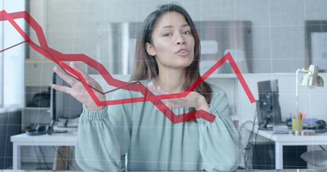 Businesswoman Analyzing Declining Financial Graph in Office - Download Free Stock Images Pikwizard.com