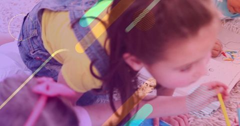 Kids coloring together on cozy rug with girl holding yellow pencil in denim overalls