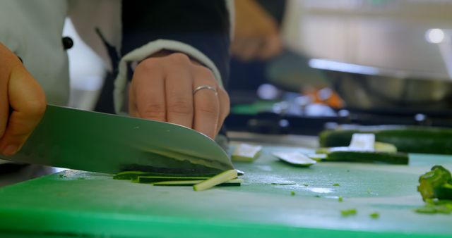 Chef Slicing Zucchini in Professional Kitchen Setting - Download Free Stock Images Pikwizard.com