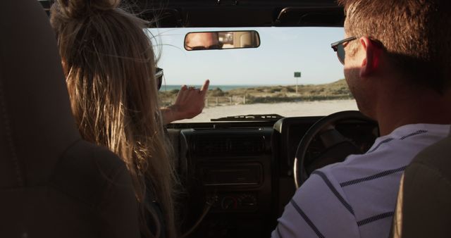 Couple in Convertible Driving to Beach Destination - Download Free Stock Images Pikwizard.com