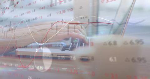 Digital Financial Data Overlay with Person Using Laptop