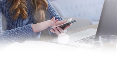 Woman Disinfecting Smartphone Near Laptop During Pandemic - Download Free Stock Images Pikwizard.com