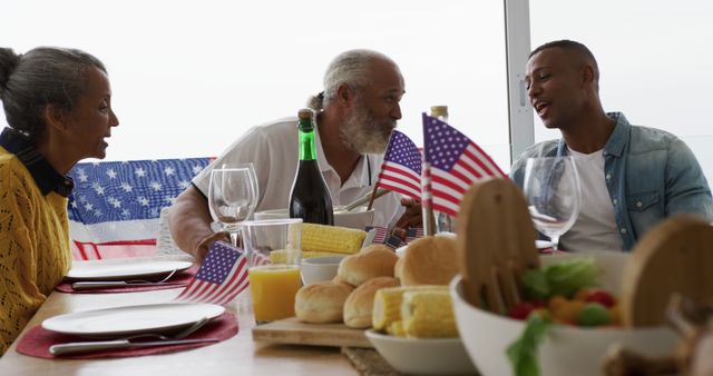 Multigenerational Family Celebrating Independence Day with Lunch - Download Free Stock Images Pikwizard.com