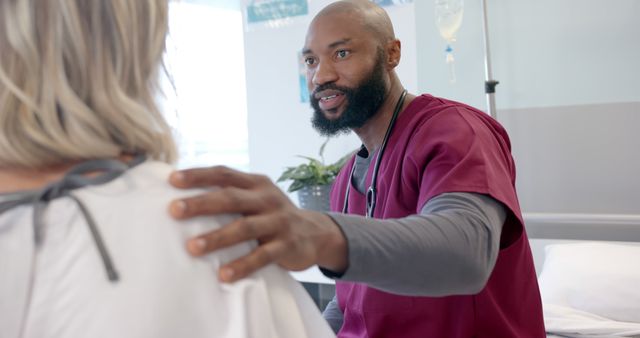 Male Nurse Providing Comfort to Female Patient in Hospital Room - Download Free Stock Images Pikwizard.com