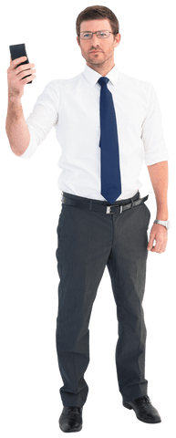 Confident Businessman Holding Smartphone on Transparent Background - Download Free Stock Videos Pikwizard.com