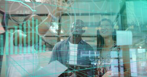 Diverse team analyzing global financial data in modern office
