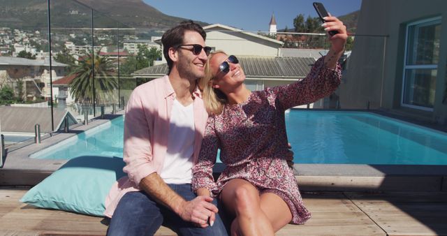 Happy Couple Taking Selfie by Rooftop Pool on Sunny Day - Download Free Stock Images Pikwizard.com