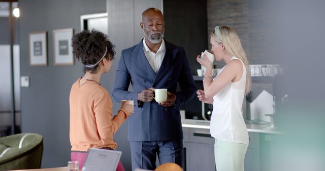 Diverse Colleagues Enjoying Coffee Break in Modern Office Kitchen - Download Free Stock Images Pikwizard.com