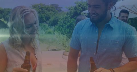 Diverse Friends Enjoying Relaxing Outdoor BBQ Celebration