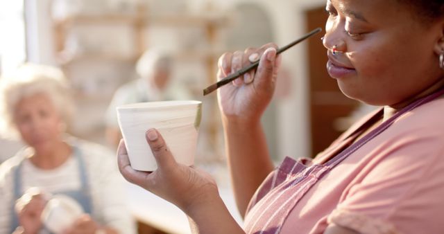 Woman Focused on Crafting Clay Pot in Pottery Class - Download Free Stock Images Pikwizard.com