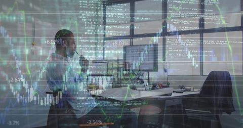 Analyzing Financial Data: Focused Businessman at Office Desk - Download Free Stock Images Pikwizard.com