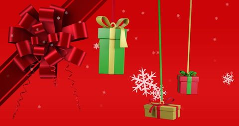 Festive Christmas Presents with Red Ribbons and Falling Snow - Download Free Stock Images Pikwizard.com