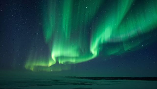 Majestic Northern Lights Illuminating Arctic Night Sky