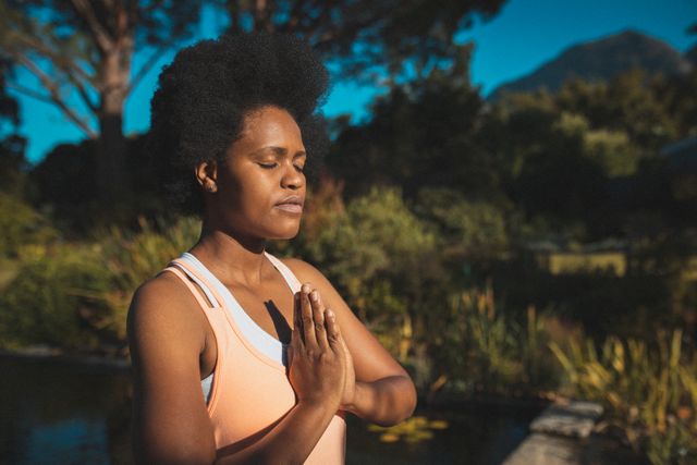 African American Woman Practicing Yoga in Sunny Garden - Download Free Stock Images Pikwizard.com