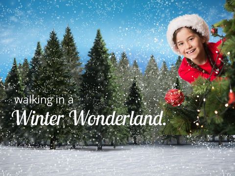 Joyful Child Decorating Christmas Tree in Snowy Forest - Download Free Stock Templates Pikwizard.com